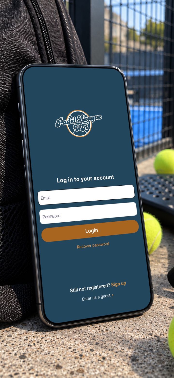 The Padel League UK app log in screen on a phone, resting against a padel court fence.